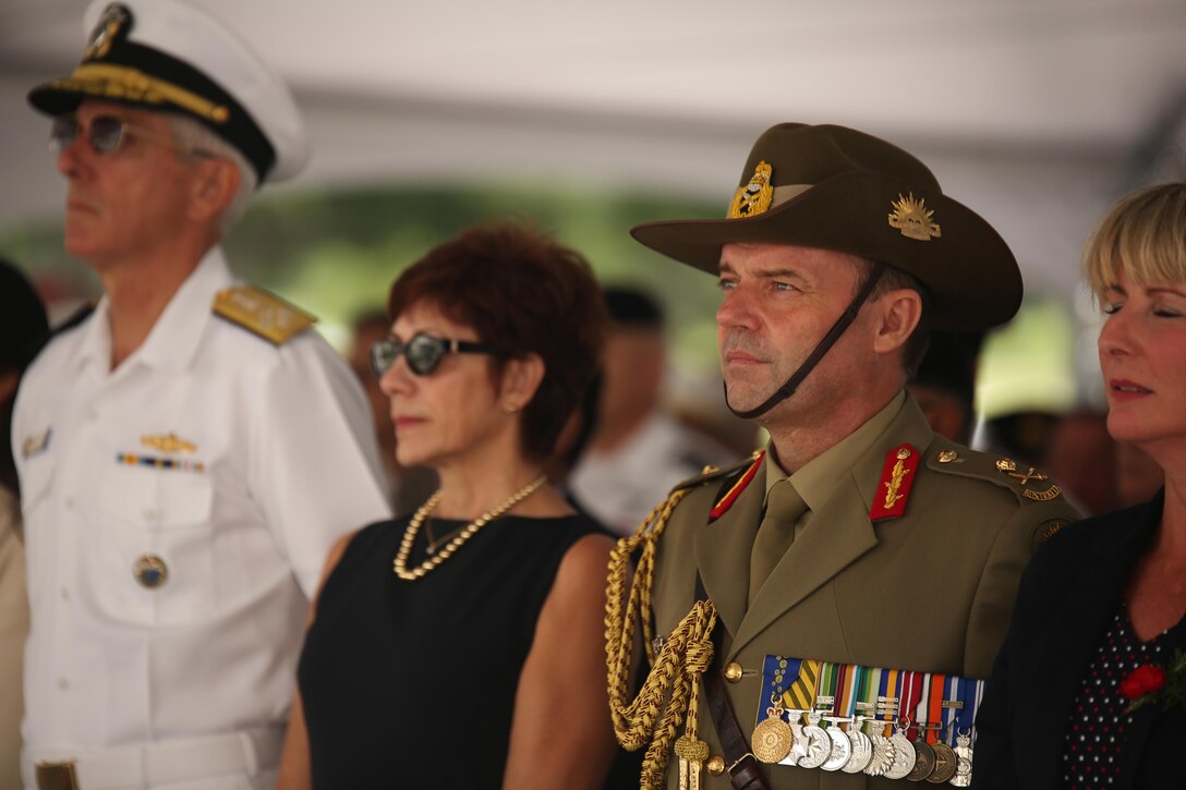 Australian Army Maj. Gen. Greg Bilton, deputy commanding general of operations with U.S. Army Pacific (right), stands among other attendees during the ANZAC Day Ceremony April 25, 2015, at the National Memorial Cemetery of the Pacific. The day commemorated the 100th anniversary of the Gallipoli Campaign, fought by Australian-New Zealand Army Corps forces in World War I. The battle is remembered for the valiant men and the significant losses the nations both suffered. Those who fought are known as “ANZACS” and are honored in one of the most recognized holidays in the South Pacific.