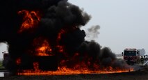 The fire pit burns April 22, 2015, at U.S. Army Garrison Humphreys', Republic of Korea. Firefighters from the Humphreys' Garrison hosted training for members of the Osan Air Base, ROK, fire and emergency services department. (U.S. Air Force photo by Staff Sgt. Benjamin Sutton/Released)
