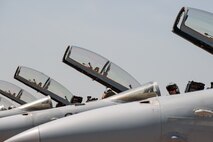 F/A-18 Hornet pilots from Marine Fighter Attack Squadron 225 start up their jets for a sortie during Exercise Max Thunder 15-1 at Gwangju Air Base, Republic of Korea, April 16, 2015. Max Thunder is a regularly scheduled training exercise designed to enhance readiness of U.S. and ROK air forces to defend the ROK. (U.S. Air Force photo by Senior Airman Taylor Curry/Released)