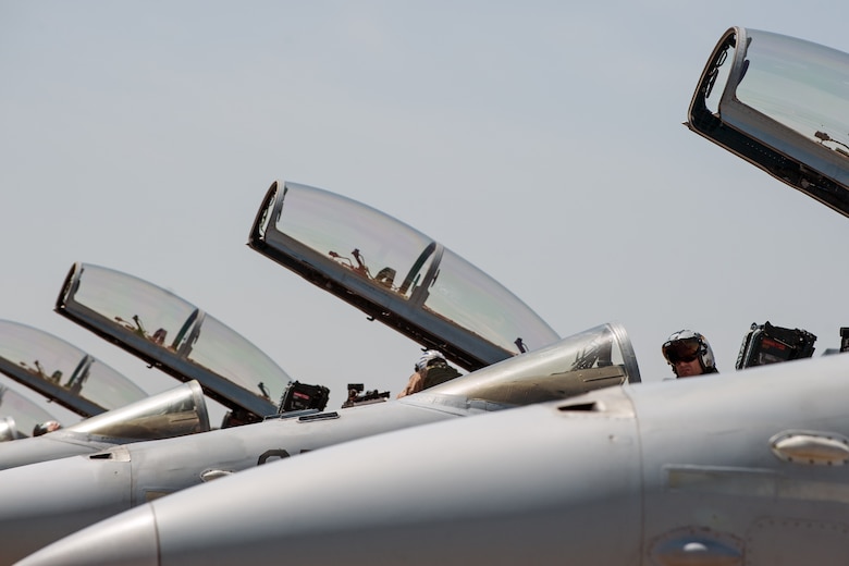 F/A-18 Hornet pilots from Marine Fighter Attack Squadron 225 start up their jets for a sortie during Exercise Max Thunder 15-1 at Gwangju Air Base, Republic of Korea, April 16, 2015. Max Thunder is a regularly scheduled training exercise designed to enhance readiness of U.S. and ROK air forces to defend the ROK. (U.S. Air Force photo by Senior Airman Taylor Curry/Released)