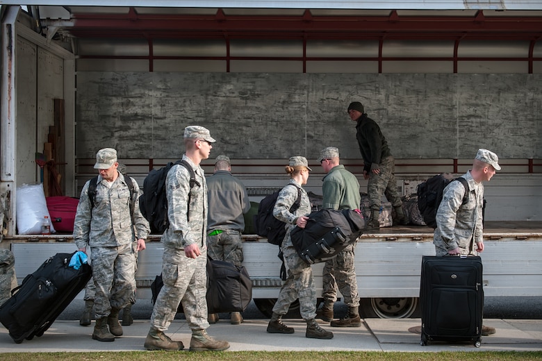 8th Fighter Wing Airmen load luggage into a truck after receiving a deployment briefing at Kunsan Air Base, Republic of Korea, April 10, 2015. Approximately 170 Wolf Pack personnel departed for Gwangju Air Base,ROK, to participate in Exercise Max Thunder 15-1, the largest flying exercise held on the Korean Peninsula. (U.S. Air Force photo by Senior Airman Taylor Curry/Released) 