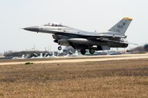An F-16 Fighting Falcon takes off from Kunsan Air Base, Republic of Korea, to participate in Exercise Max Thunder 15-1 April 10, 2015, at Gwangju Air Base, ROK. The Wolf Pack joined other U.S. Air Force, Marine Corps and ROKAF flying units to integrate with dissimilar aircraft and practice realistic combat scenarios as one large force. (U.S. Air Force photo by Senior Airman Taylor Curry/Released)