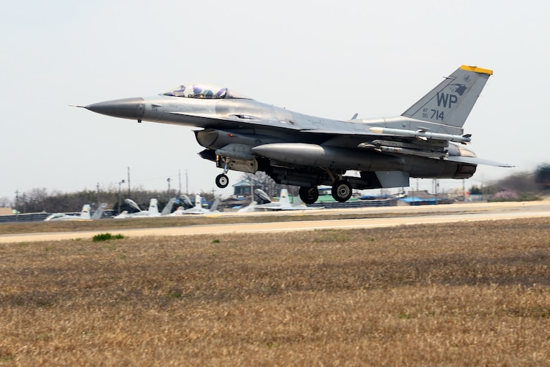 An F-16 Fighting Falcon takes off from Kunsan Air Base, Republic of Korea, to participate in Exercise Max Thunder 15-1 April 10, 2015, at Gwangju Air Base, ROK. The Wolf Pack joined other U.S. Air Force, Marine Corps and ROKAF flying units to integrate with dissimilar aircraft and practice realistic combat scenarios as one large force. (U.S. Air Force photo by Senior Airman Taylor Curry/Released)