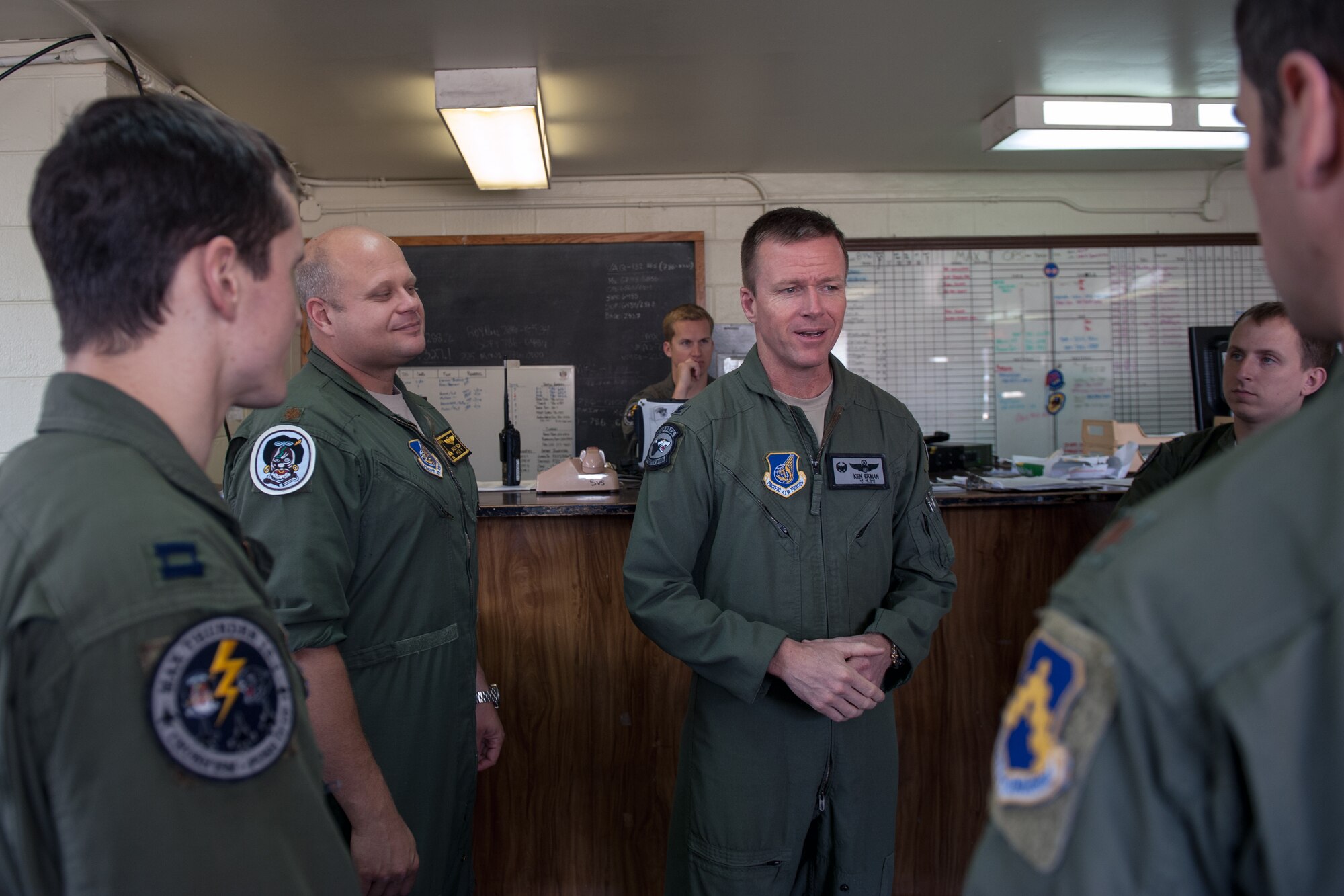Col. Ken “Wolf” Ekman, 8th Fighter Wing commander, speaks to pilots after a flight brief during Exercise Max Thunder 15-1 at Gwangju Air Base, Republic of Korea, April 21, 2015. The Wolf Pack joined other U.S. Air Force, Marine Corps and ROKAF flying units to integrate with dissimilar aircraft and practice realistic combat scenarios as one large force. (U.S. Air Force photo by Senior Airman Taylor Curry/Released)