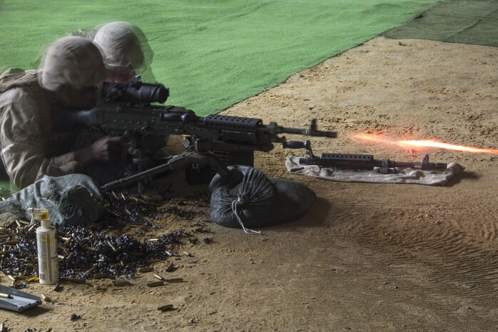 Marines with Marine Wing Support Squadron 171, Motor Transport Company, fire a M240 bravo machine gun during a live-fire range at the Japan Ground Self-Defense Force’s Haramura Maneuver Area’s indoor small-arms range during Exercise Haramura 1-15 in Hiroshima, Japan, April 16, 2015. Haramura is a weeklong company-level training exercise focused on reinforcing the skills Marines learned during Marine Combat Training and their Military Occupational Specialty schooling.