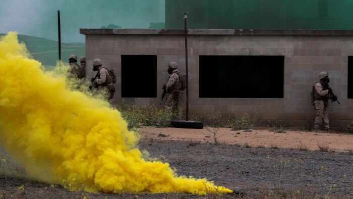 Marines with 1st Battalion, 7th Marine Regiment clear a building in a simulated combat town during the culminating event of Division School’s Urban Leaders Course aboard Marine Corps Base Camp Pendleton, California, April 22, 2015. The three-week course is designed to prepare Marines to lead in an urban environment.