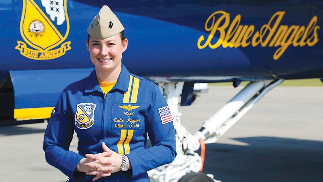 Marine Capt. Katie Higgins, the first female pilot with the U.S. Navy Flight Demonstration Squadron, or Blue Angels, speaks with media aboard Marine Corps Air Station Beaufort, South Carolina, April 9, 2015. The Severna Park, Maryland native is now the newest pilot of "Fat Albert," a C-130 Hercules flown by the Blue Angels. (U.S. Marine Corps photo by Lance Cpl. Olivia G. Ortiz/Released)
