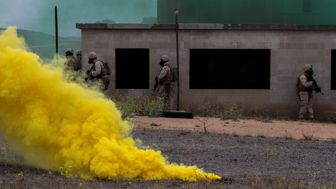 Marines with 1st Battalion, 7th Marine Regiment clear a building in a simulated combat town during the culminating event of Division School’s Urban Leaders Course at Marine Corps Base Camp Pendleton, California, April 22, 2015. The three-week course is designed to prepare Marines to lead in an urban environment.
