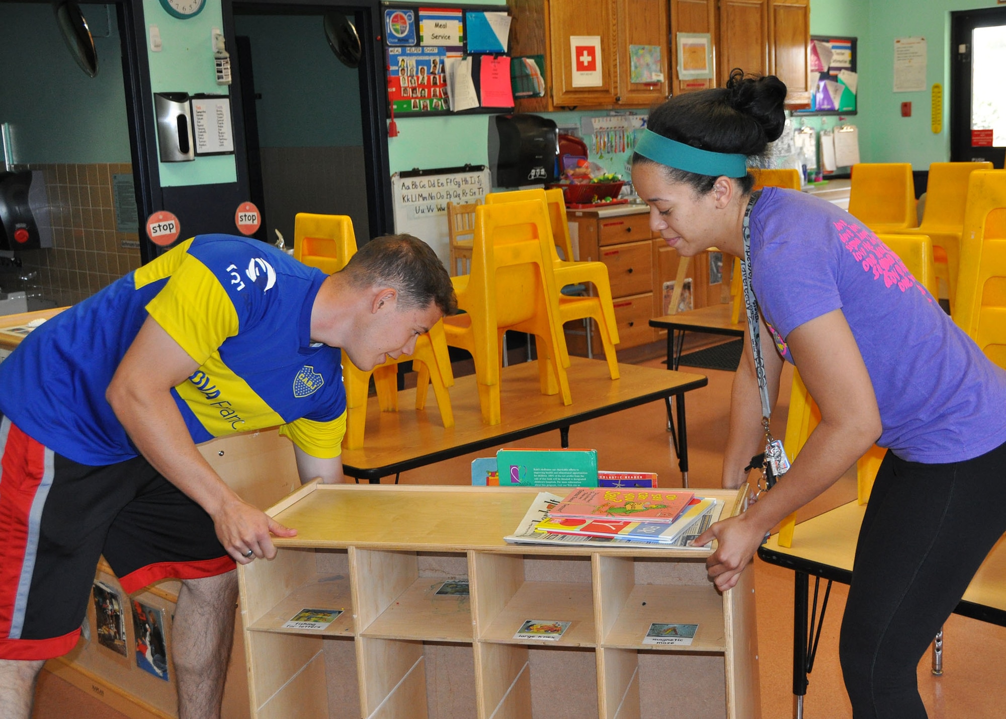 rnold Docksteader and Ciara Mimms, both trainees in the 944th Fighter Wing Development and Training Flight, spent the April UTA learning what it means to be a good wingman by volunteering to help deep clean the Luke AFB Child Development Center. Docksteader a native of Ariz., who has always wanted to serve in the Air Force, will be graduating from Central Arizona Collage with an Agriculture Degree and entering basic military training in May. After basic and technical training he will be stationed at Davis-Monthan Air Force Base in Tucson as an A-10 aircraft mechanic. Mimms, originally from Calif., is currently a pre-med student at ASU and an avid volunteer who comes from a military family, she will also be attending BMT in May. After basic and technical school she will be stationed here at the 944th FW in the ASTS Squadron in medical administration. (U.S. Air Force photo taken by Tech. Sgt. Barbara Plante) 