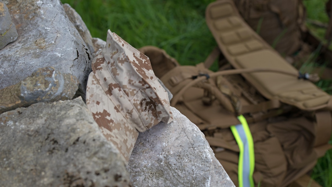 A cover rests on a historic stone wall during a hike conducted by Marine Corps Air Facility Quantico from Marine Corps Base Quantico, Va. in Antietam National Battlefield, Sharpsburg, Maryland April 24, 2015. The hike and battle study was part of a professional military education and unit cohesion building event for the unit. The Battle of Antietam was the first invasion of the North by Confederate troops during the civil war and the bloodiest one-day battle in American history. By 1 p.m. Sept. 17, 1862, Maj. Gen. Ambrose E. Burnside and his troops, who had been fighting to cross the Antietam Creek since the morning, finally pushed the Confederates back across the bridge and up towards Sharpsburg, Md.