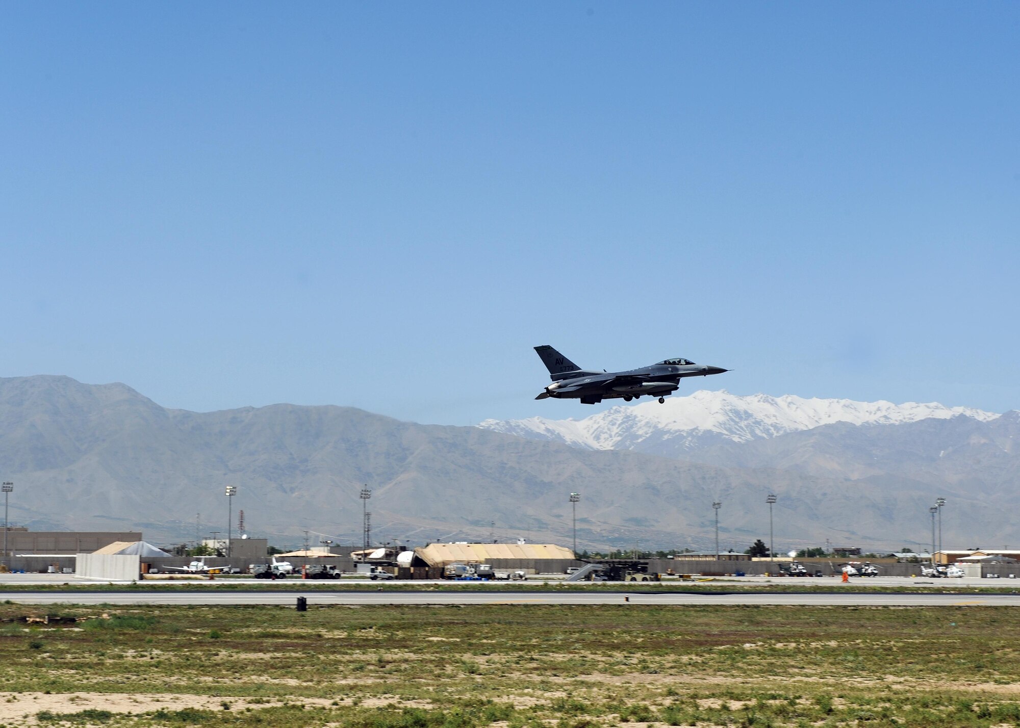 An F-16 Fighting Falcon “Triple Nickel” aircraft assigned to the 555th Fighter Squadron from Aviano Air Base, Italy, prepares to land on the flightline at Bagram Airfield, Afghanistan, April 27, 2015. Members of the Triple Nickel are deployed in support of Operations Freedom’s Sentinel and Resolute Support and are in theater to replace the 4th Fighter Squadron from Hill Air Force Base, Utah. (U.S. Air Force photo by Staff Sgt. Whitney Amstutz/released)