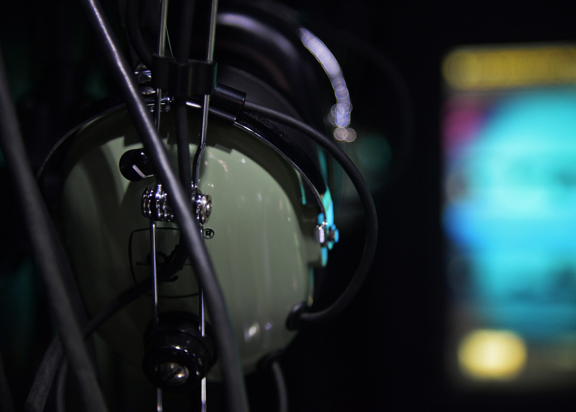 A headset rests in the MC-130 J Commando II simulator during a tour given to 27th Special Operations Wing Staff Agency Airmen April 21, 2015 at Cannon Air Force Base, N.M. The tour gave Air Commandos a better understanding of what their teammates accomplish on a daily basis. (U.S. Air Force photo/Airman 1st Class Chip Slack)