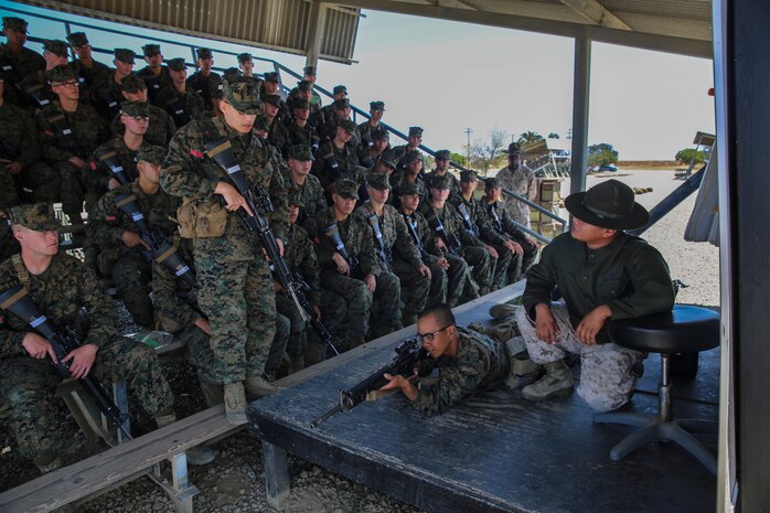 Recruits of Charlie Company, 1st Recruit Training Battalion, learn the proper prone position during a class at Edson Range, Marine Corps Base Camp Pendleton, Calif., April 14. Recruits spent one week learning and practicing the fundamentals of marksmanship, ensuring they are confident for the live-fire qualification. Once the recruits become familiar with the fundamentals, they are expected to apply them through snapping in and at the Indoor Simulated Marksmanship Trainer. Today, all male recruits recruited from recruiting stations west of the Mississippi are trained at MCRD San Diego. The depot is responsible for training more than 16,000 recruits annually. Charlie Company is scheduled to graduate June 5. 