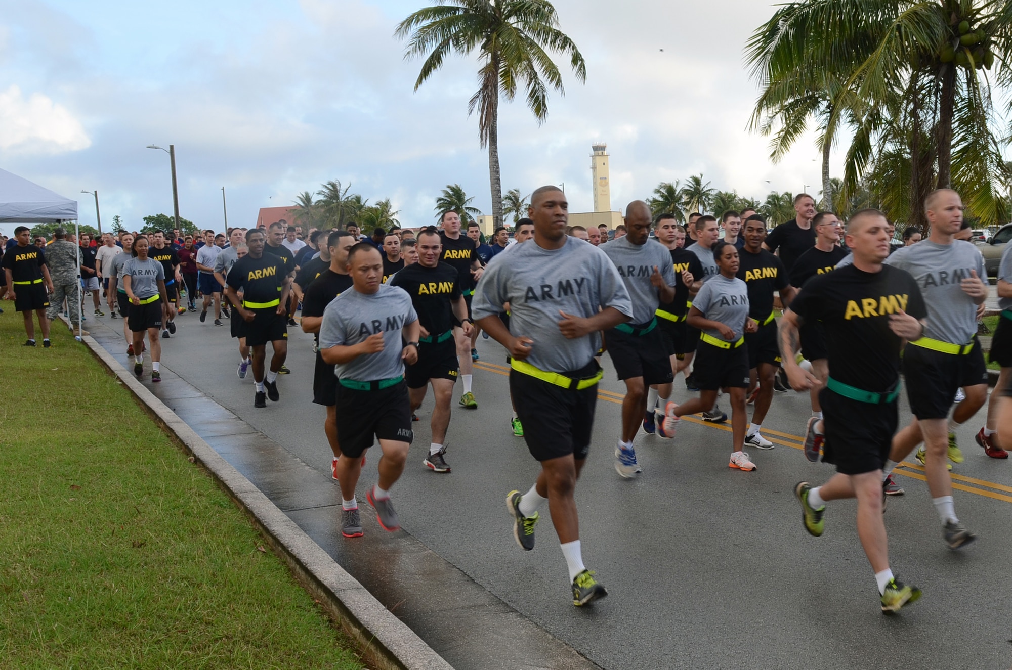 Participants begin the Sexual Assault Awareness Month 5K at Andersen Air Force Base, Guam, April 27, 2015. The Sexual Assault Awareness Month 5K was held by the 94th Army Air and Missile Defense Command Task Force Talon. The 5K brought the sister services together to bring awareness to sexual assault prevention. (U.S. Air Force photo by Airman 1st Class Alexa Ann Henderson/Released)