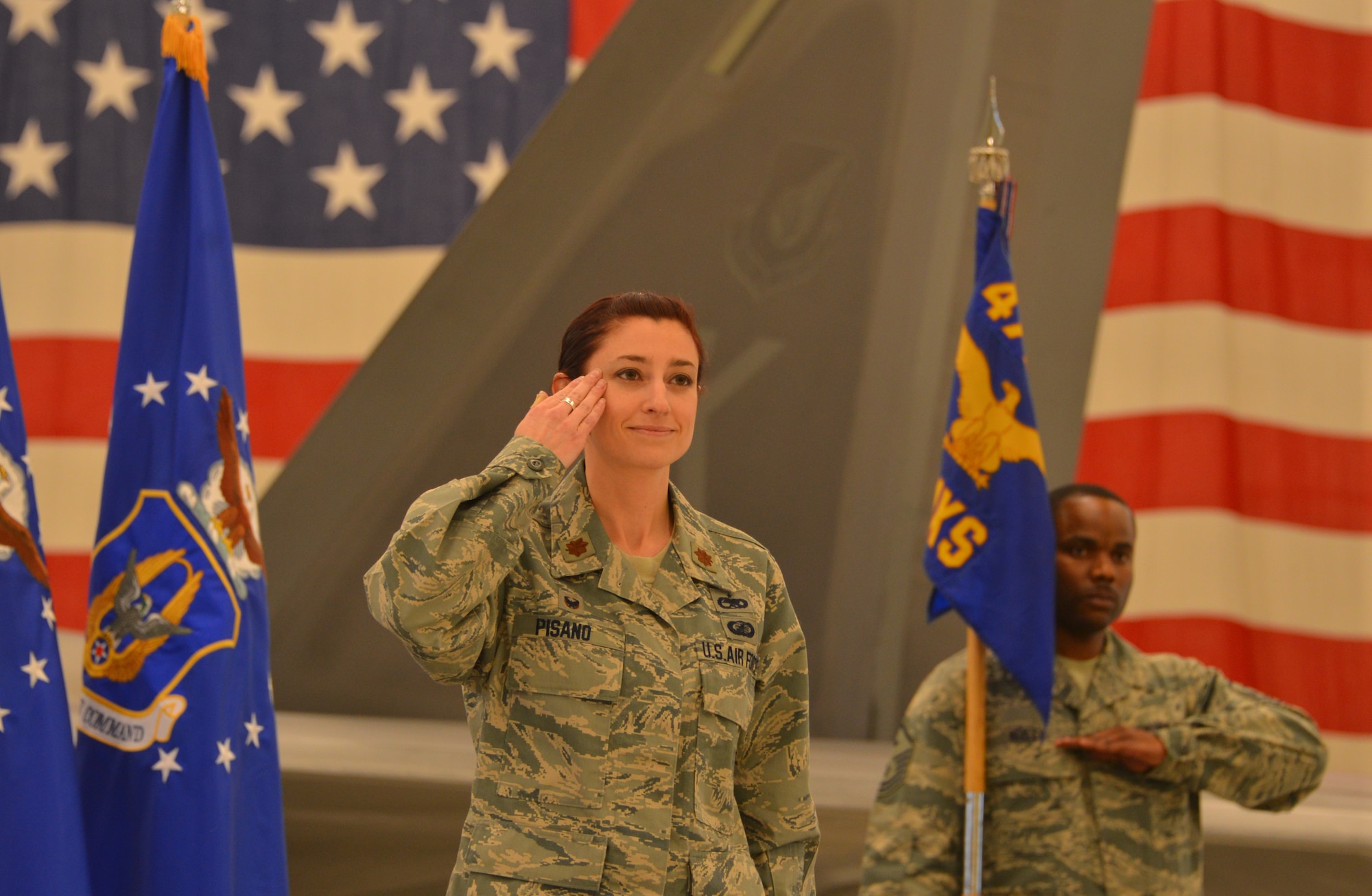 Maj. Jessica Pisano salutes the members of the 477th Aircraft Maintenance Squadron for the first time as their newly assigned commander during the unit’s change of command ceremony held here April 12, 2015. (US Air Force photo/Tech. Sgt. Dana Rosso)