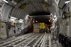 U.S. Air Force personnel load eight pallets of equipment onto a USAF C-17 Globemaster III from Joint Base Charleston, S.C., at March Air Reserve Base, Calif., April 26, 2015. The equipment is for the Urban Search and Rescue Task Force 2, or CA-TF2. When called upon, these teams travel with specialized equipment, such as heavy concrete cutting equipment, chainsaws, search cameras and sonar to locate victims, as well as specialized communications and generators.  In addition to the pallets there were 57 members of the CA-TF2 as well as six search dogs. To keep the aircraft moving, the mission will be flown by three different aircrews, two from the 437th Airlift Wing at JB Charleston and one from the 164th Airlift Wing at the Tennessee Air National Guard in Memphis, TN.  (U.S. Air Force photo by Airman 1st Class Taylor Queen/Released) 