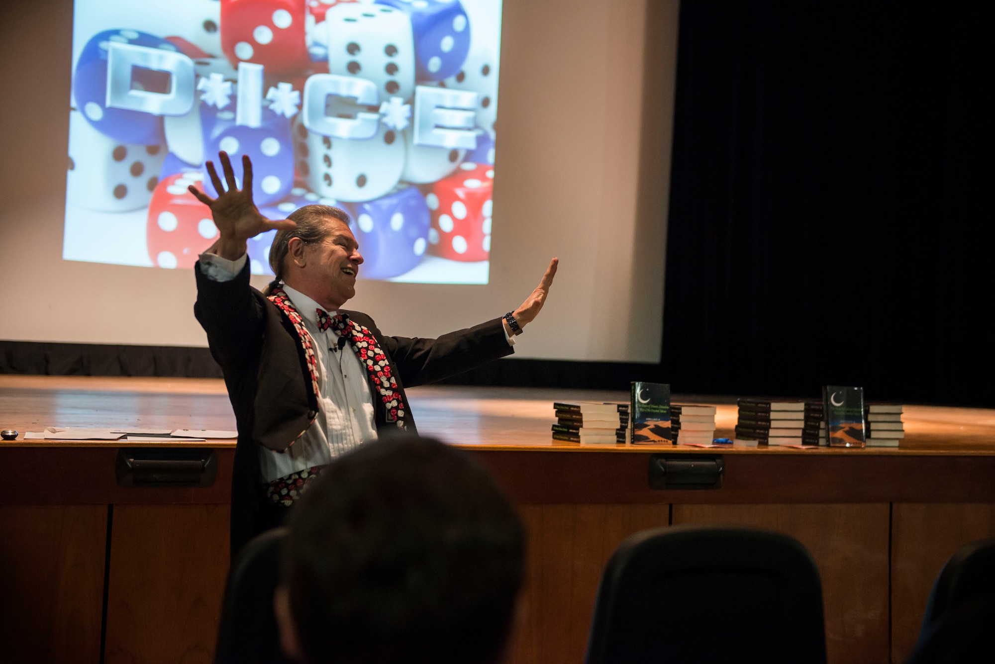 Ray Semko, a retired counterintelligence special agent for the Army and the Defense Intelligence Agency, briefed an audience on security awareness and operational security April 27, 2015, at Joint Base Charleston, S.C. Joseph Butta, an analyst who specialized in issues related to the Middle East, joined Semko and provided a presentation on Islamic literalism. The briefings were used to educate Airmen, Sailors and civilians on today’s threats against the Western world. (U.S. Air Force photo/Senior Airman Jared Trimarchi)  