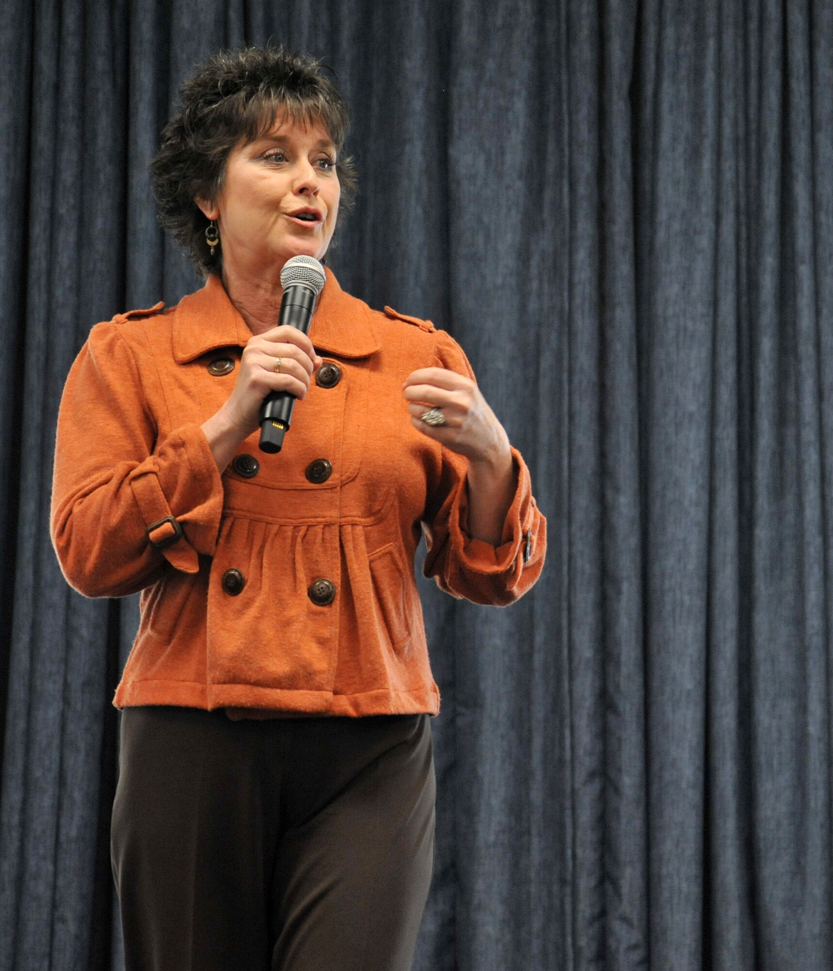 Shelly Monahan-Cain, a sexual assault survivor, talks with Team Fairchild about how she healed from her sexual assault through her faith in God, supportive coworkers and family, April 21, 2015, in the Red Morgan Center at Fairchild Air Force Base, Wash. Monahan is a sexual assault survivor and was one of 40 victims of a high profile criminal in the late 1970s and early 1980s named the South Hill Rapist. Throughout her speech, she said she wants to encourage people who have gone through any type of traumatizing experience to not let it ruin or define who they are as a person. (U.S. Air Force photo/Staff Sgt. Samantha Krolikowski)