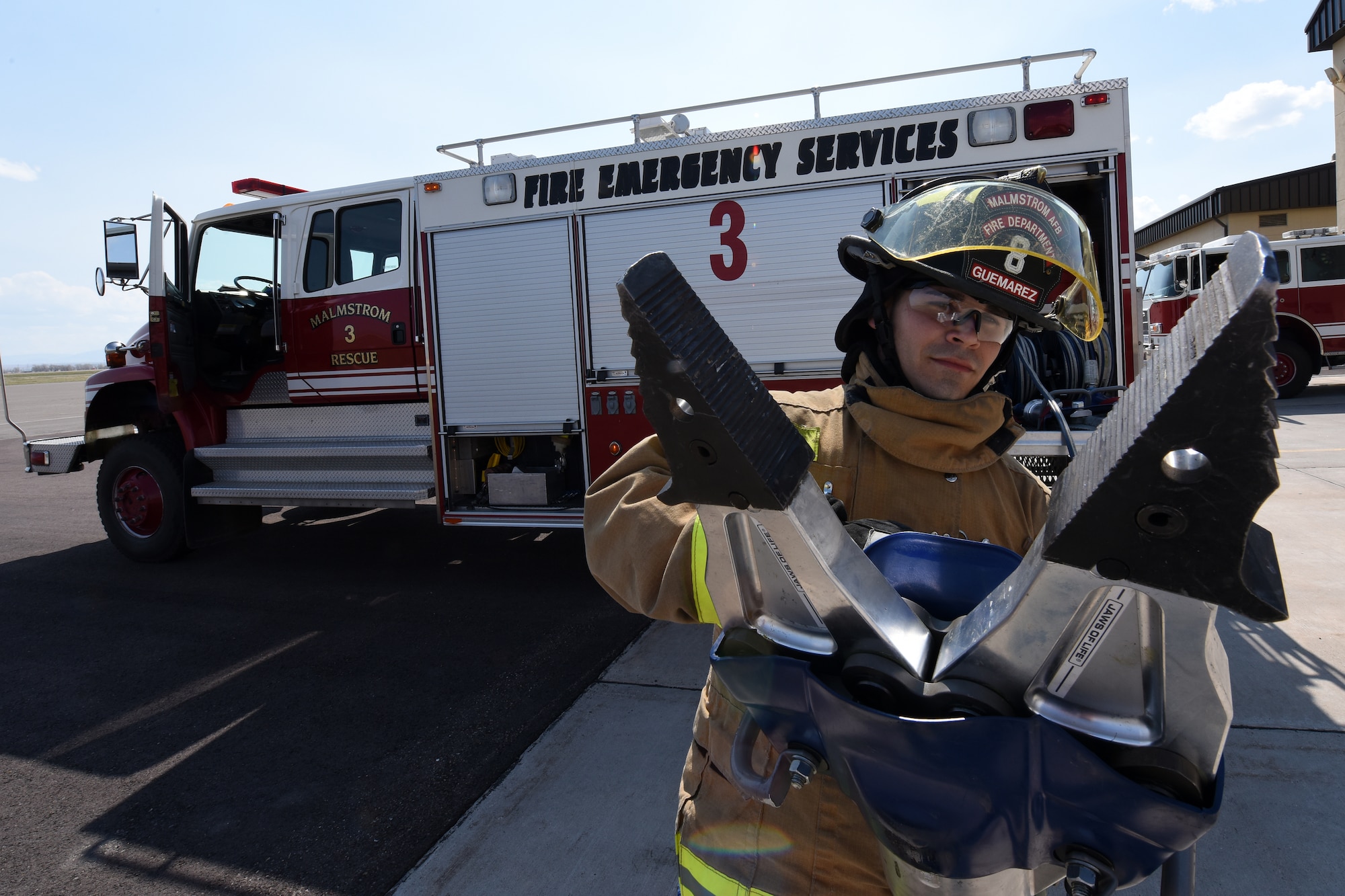 Senior Airman Hector Guemarezcolon, 341st Civil Engineer Squadron firefighter, prepares to accomplish morning checkout on rescue-truck equipment April 22, 2015, at Malmstrom Air Force Base, Mont. Crews at the Malmstrom Fire Department operate on 24-hour shifts and must be in full gear and out the door within 60 seconds from the moment an alarm sounds. (U.S. Air Force photo/Chris Willis)