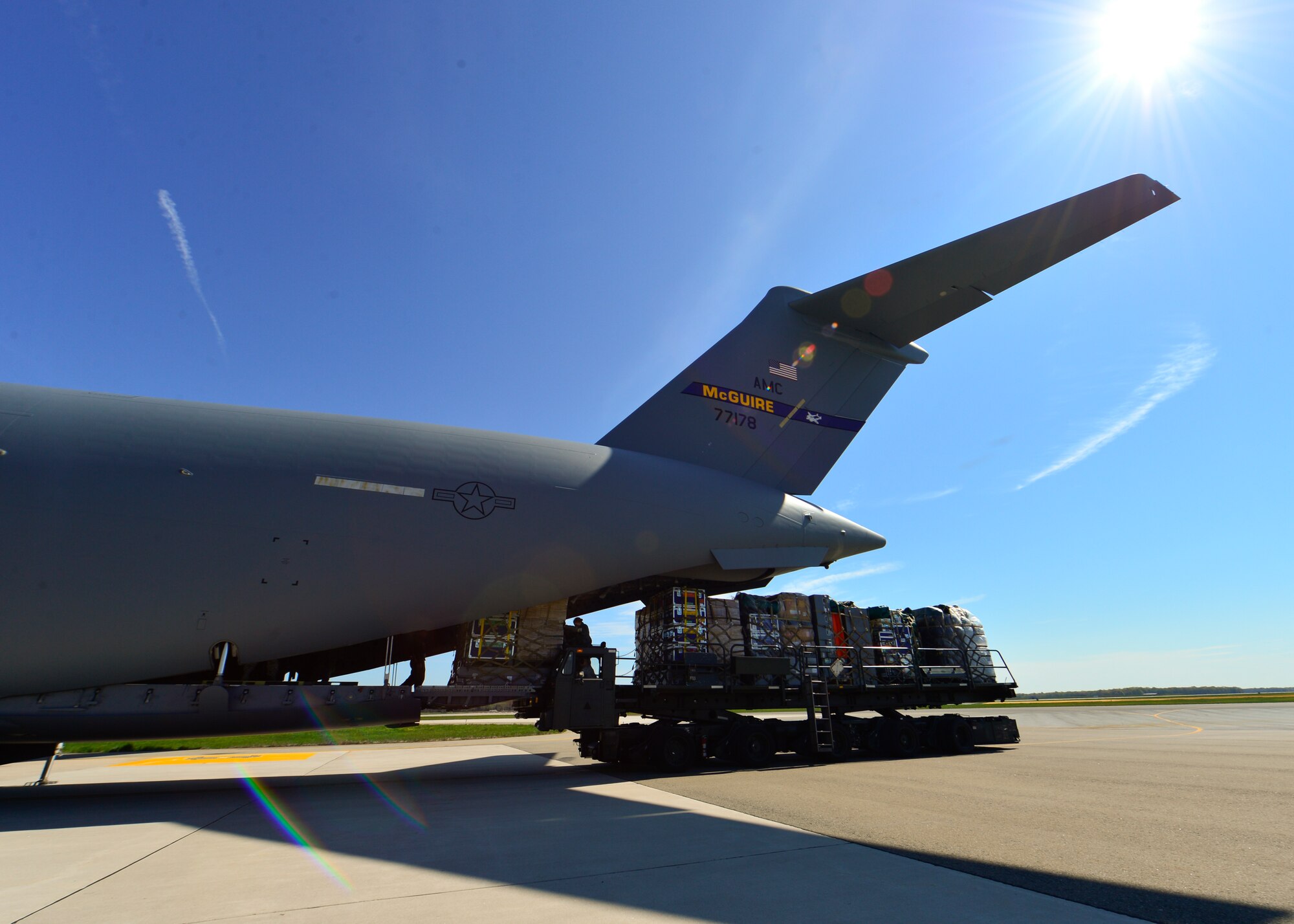 U.S. Air Force Airmen, Dover AFB, Del., load a C-17 Globemaster III with approximately 70,000 pounds of equipment and supplies for the Fairfax County Urban Search and Rescue Team, April 26, 2015, at Dover Air Force Base, Del. The 69-member team is deploying to Nepal to assist with rescue operations after the country was struck by a 7.8-magnitude earthquake. (U.S. Air Force photo/Airman 1st Class William Johnson)