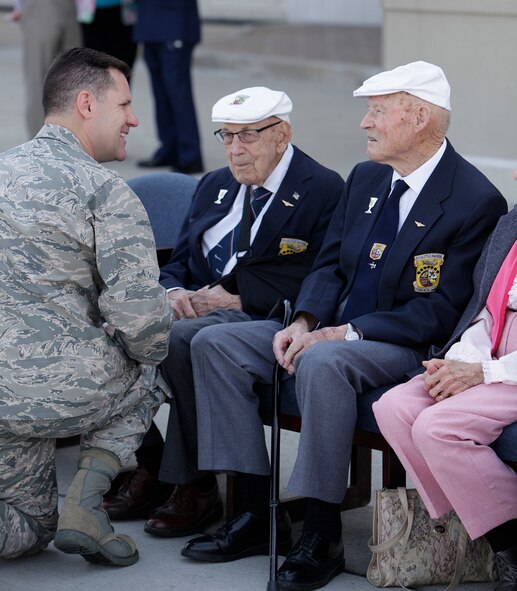 Col. John Devillier, installation commander, Wright-Patterson Air Force Base, welcomes Doolittle Raiders retired Lt. Col. Dick Cole and former Staff Sgt. David Thatcher to Wright-Patterson Air Force Base, Ohio, April 18. The Congressional Gold Medal, which is the highest civilian honor Congress can give on behalf of Americans, was entrusted to the National Museum of the U.S. Air Force, Dayton, Ohio, on April 18 by Cole and Thatcher, who are the two remaining Doolittle Raiders. (U.S. Air Force photo/Released)