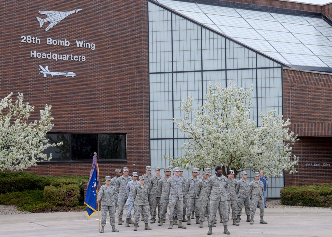 Ellsworth Airmen participate in a retreat ceremony at Ellsworth Air Force Base, S.D., April 17, 2015. The retreat ceremony took place in remembrance of the Doolittle Raid, when the United States flew into Tokyo, Japan to attack military targets on April 18, 1942. (U.S. Air Force photo by Airman 1st Class Rebecca Imwalle / Released)