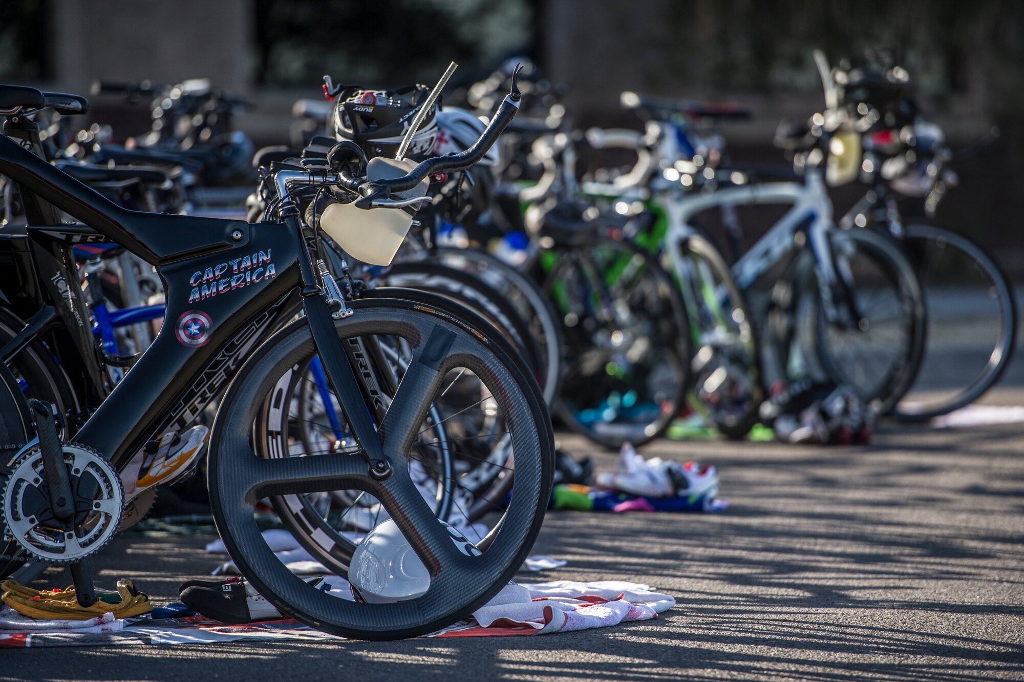 Road bikes are staged and await the participants of the Joker Duathlon to finish the initial 5k run before embarking on the 30k bike ride around Holloman Air Force Base, N.M., April 25, 2015. The participants must complete a 5k run before riding their bicycles around the base perimeter on a 30k ride, then complete the duathlon with a final 3k run. Participants entered the duathlon as both individuals and in teams of two. (U.S. Air Force photo by Airman 1st Class Aaron Montoya / Released)