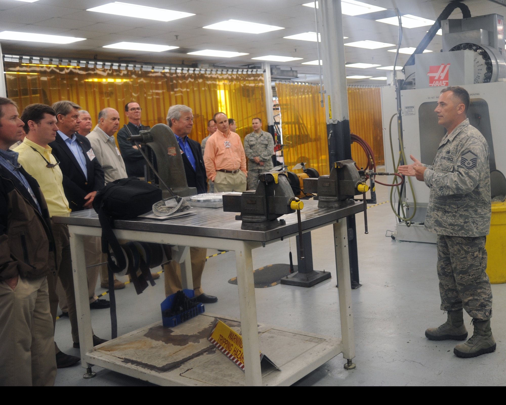 Mater Sgt. Terry Willis, 927th Aircraft Maintenance Squadron, fabrication flight chief explains to civic leaders associated with the 908th Airlift Wing, Maxwell Air Force Base, Alabama, the challenges associated with maintaining the KC-135. The 927th Air Refueling Wing, MacDill Air Force Base, Fla., hosted the visiting civics for a two day educational tour, April 23-24. (U.S. Air Force photo/Senior Airman Xavier Lockley)