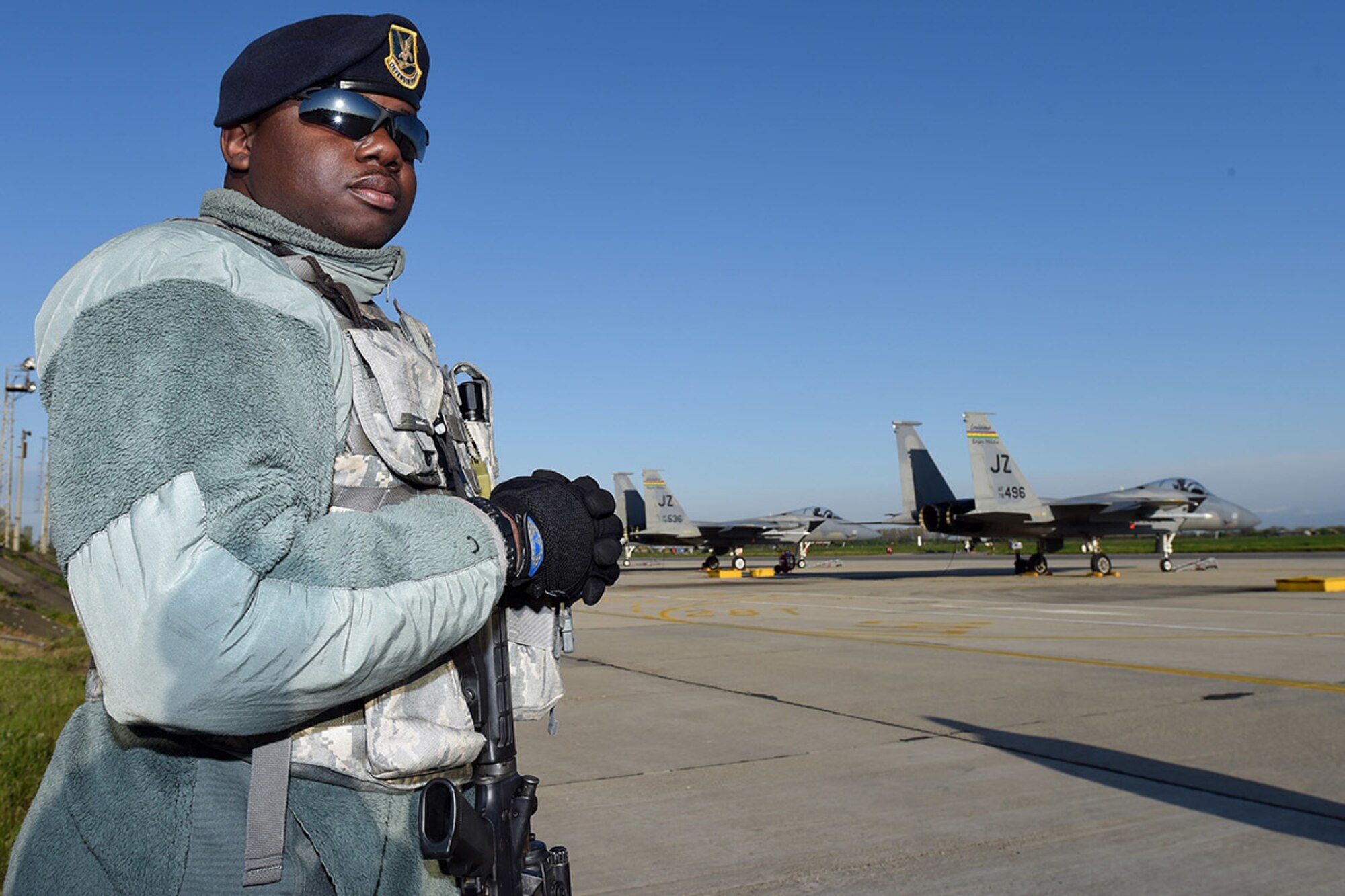 Staff Sgt. Keenan Spicer, 159th Security Force Squadron, Louisiana National Guard, stands guard on the flight line at Graf Ignatievo Air Base, near Plovdiv, Bulgaria, April 22, 2015. Thracian Eagle 2015 will enhance interoperability with Bulgaria and maintain joint readiness with NATO allies. (U.S. Air National Guard photo by Master Sgt. Toby M. Valadie, 159th Public Affairs Office/RELEASED)
