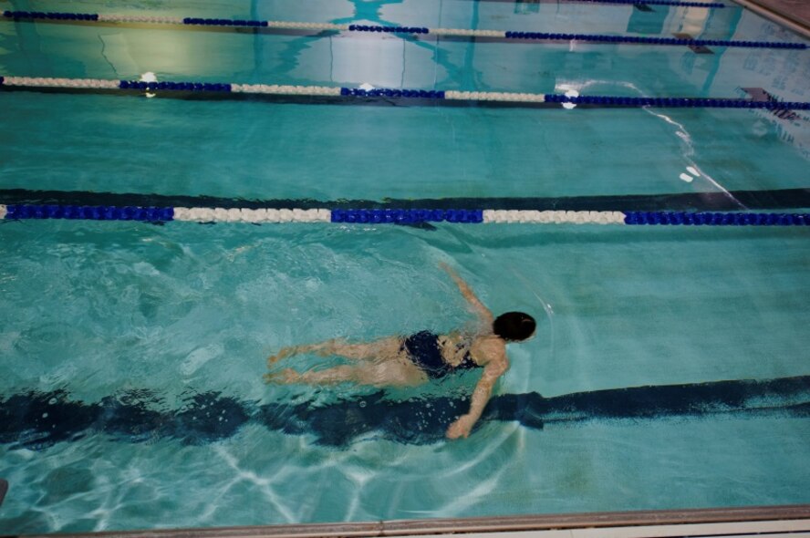 Katie Adelman finishes a lap in the pool at McAdoo Fitness Center on Minot Air Force Base, N.D., April 24, 2015.  The pool is also open on Saturdays from noon to 4 p.m. for open swim. (U.S. Air Force photo/Airman 1st Class Christian Sullivan)