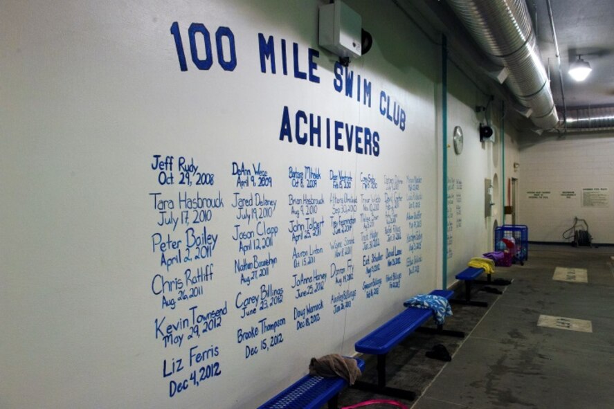 100 Mile Swim Club achievers’ names line a wall on Minot Air Force Base, N.D., April 24, 2015. For someone to get their name put on the wall they must log 100 miles at the pool in the McAdoo Fitness Center. (U.S. Air Force photo/Airman 1st Class Christian Sullivan)