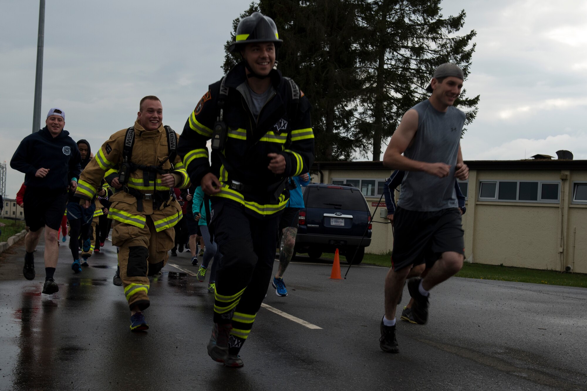 Participants of a Bitburg Middle High School Junior Reserve Officer Training Corps 5k run start the course alongside the outdoor track at Spangdahlem Air Base, Germany, April 25, 2015. The run was open to all ages. (U.S. Air Force photo by Airman 1st Class Luke Kitterman/Released)