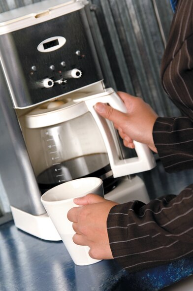 High-wattage, portable electrical appliances, such as coffee pots, coffee makers, electric heaters, and microwaves, should not be plugged into surge protectors, used with extension cords.  They should be plugged directly into a wall outlet. (Photo courtesy of Metro Creative Graphics) 
