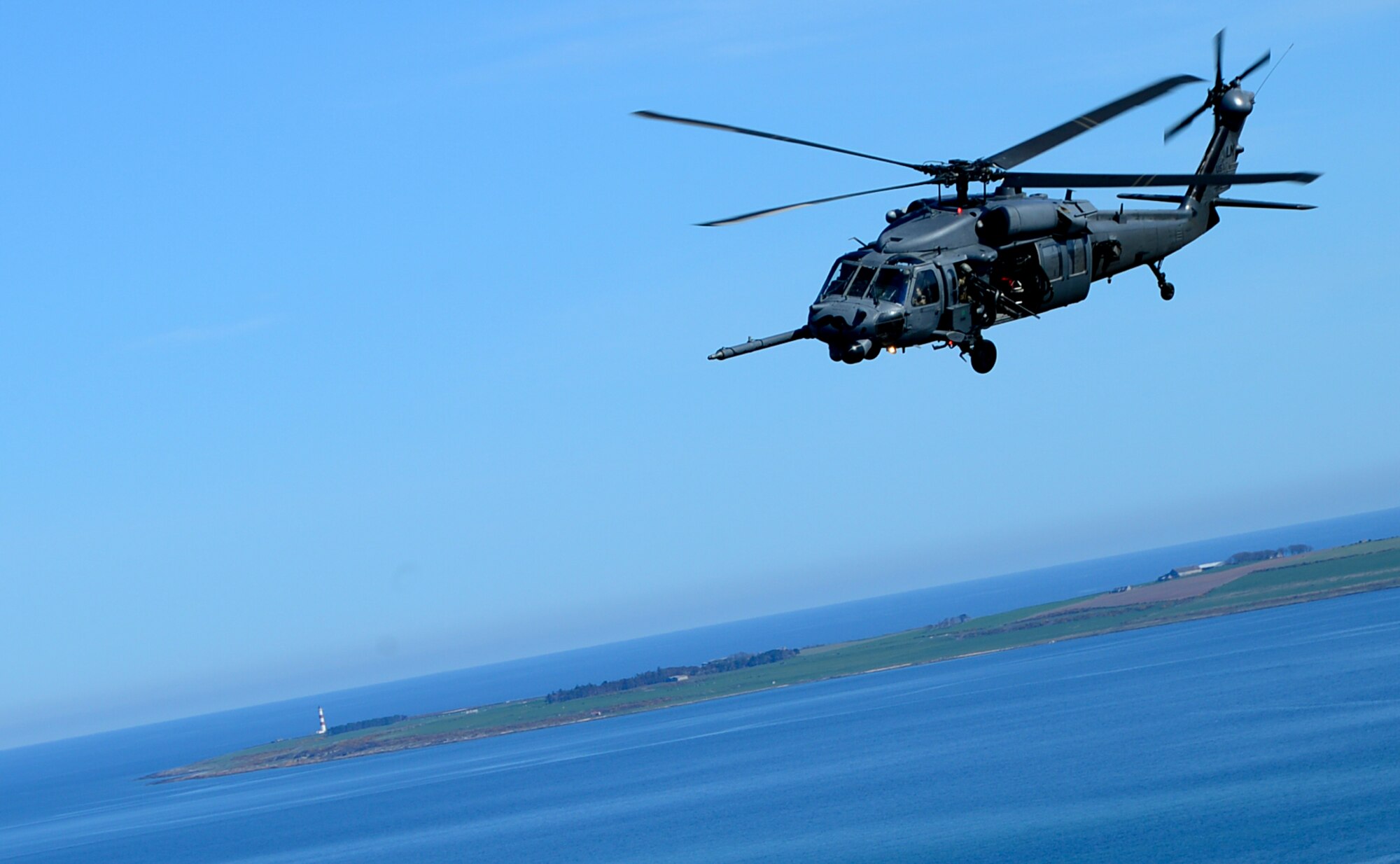 An HH-60G Pave Hawk assigned to Royal Air Force Lakenheath's 56th Rescue Squadron, flies over Scotland during exercise Joint Warrior 15-1, April 22, 2015. The training challenged aircrew, while preparing them expeditionary operations. (U.S. Air Force photo by Senior Airman Erin O'Shea/Released)