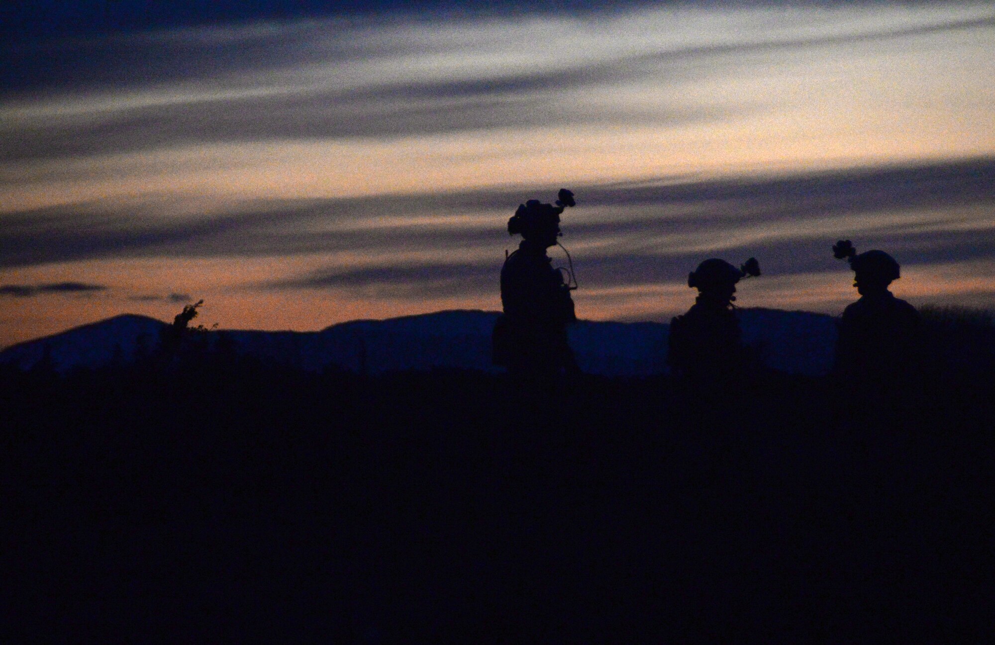Pararescuemen assigned to Royal Air Force Lakenheath's 57th Rescue Squadron participate in an evening training mission during exercise Joint Warrior 15-1 in Scotland, April 22, 2015. The exercise enhanced the 56th RQS's capability to support real-world operations, as well as provided training with other NATO nations. (U.S . Air Force photo by Senior Airman Erin O'Shea/Released)