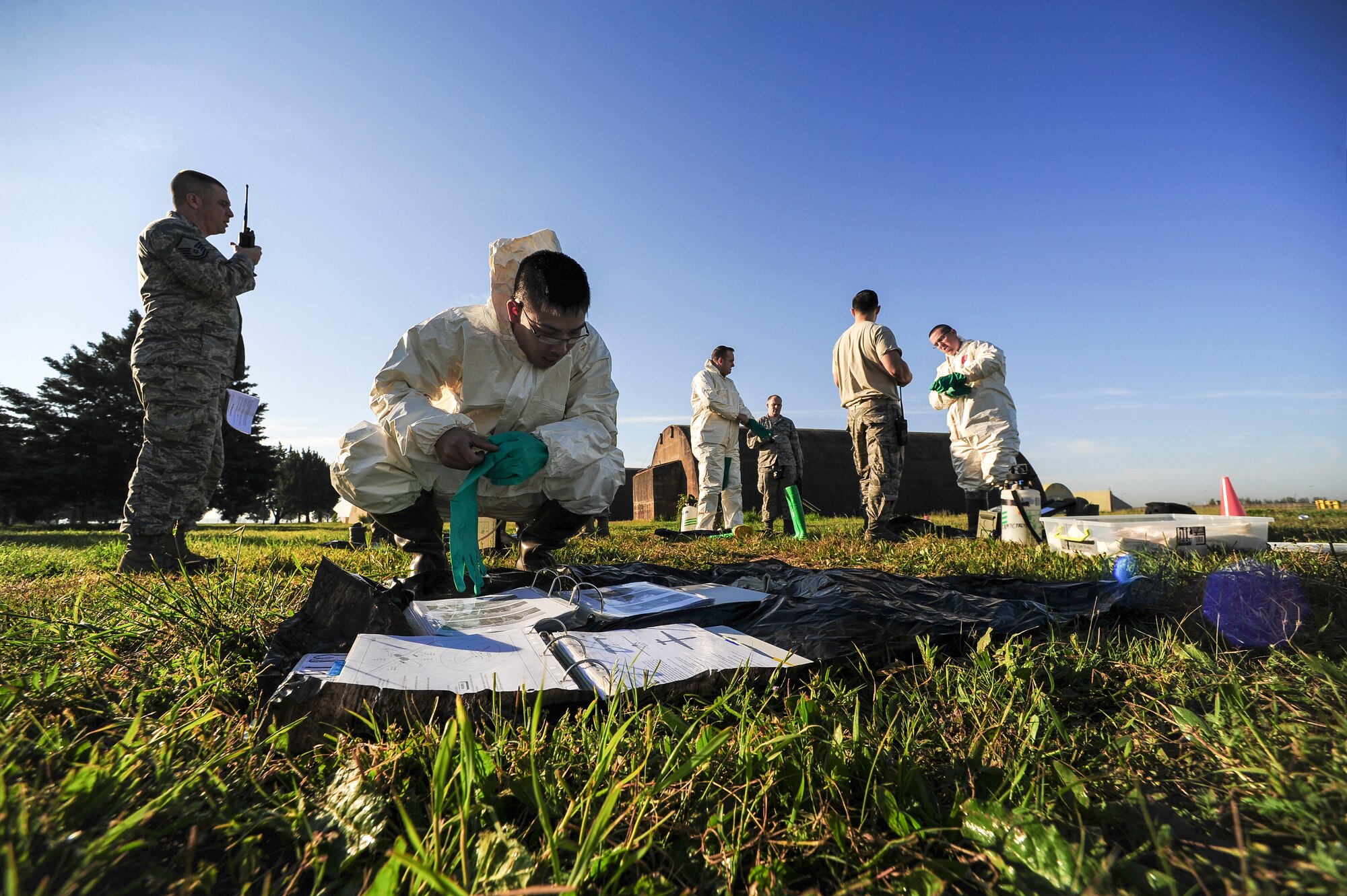Airmen from the 39th Maintenance Squadron conduct composite material handling training April 15, 2015 at Incirlik Air Base, Turkey. As part of the training Airmen had to assess a simulated crash site and decide the proper personal protective equipment best suited for the situation. (U.S. Air Force photo by Airman 1st Class Cory W. Bush/Released)