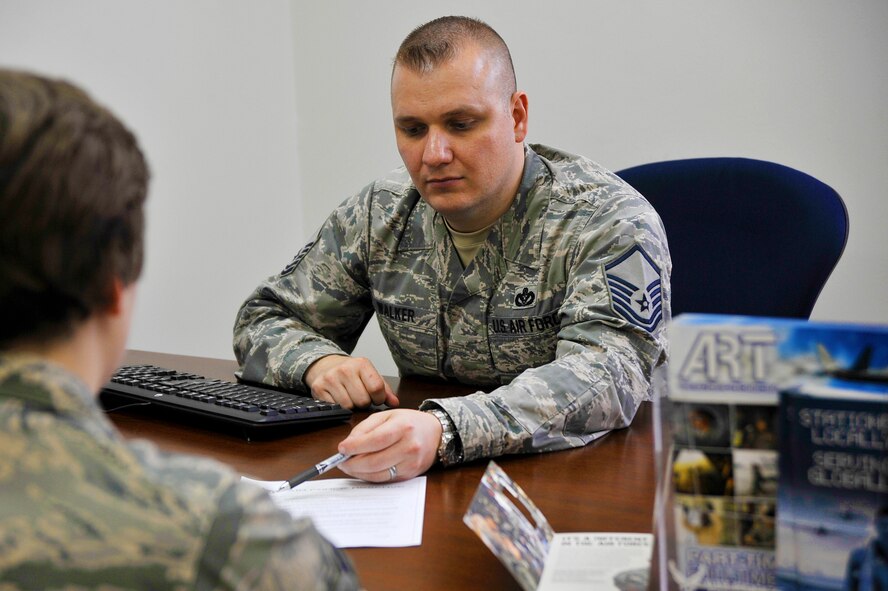 U.S. Air Force Reserve Master Sgt. Jeffrey Walker, in-service recruiter, explains some of the benefits received while in the Reserves during a visit to Misawa Air Base, Japan, April 23, 2015. Since becoming a recruiter he has seen many instances of Airmen leaving active duty without a plan and later facing hardships. He strives to make outreaches to the Air Force community, as well as members the joint services, about opportunities available in the AF Reserves. (U.S. Air Force photo by Senior Airman Jose L. Hernandez-Domitilo/Released)
