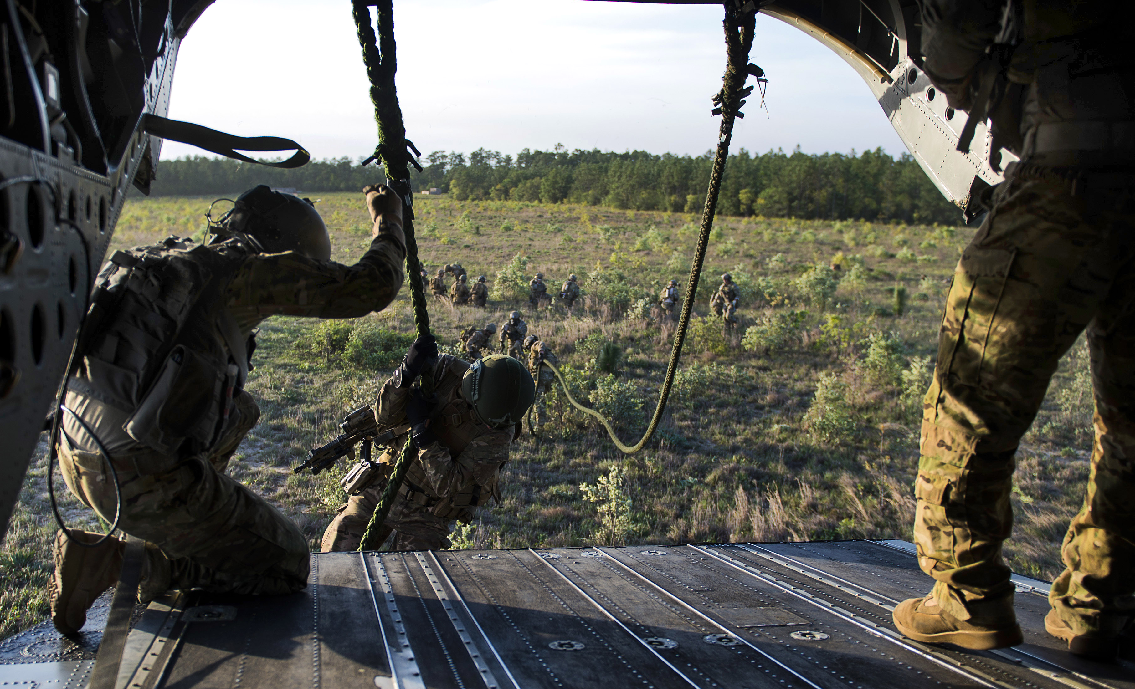 A Dutch Special Forces soldier exits a CH-47 Chinook helicopter