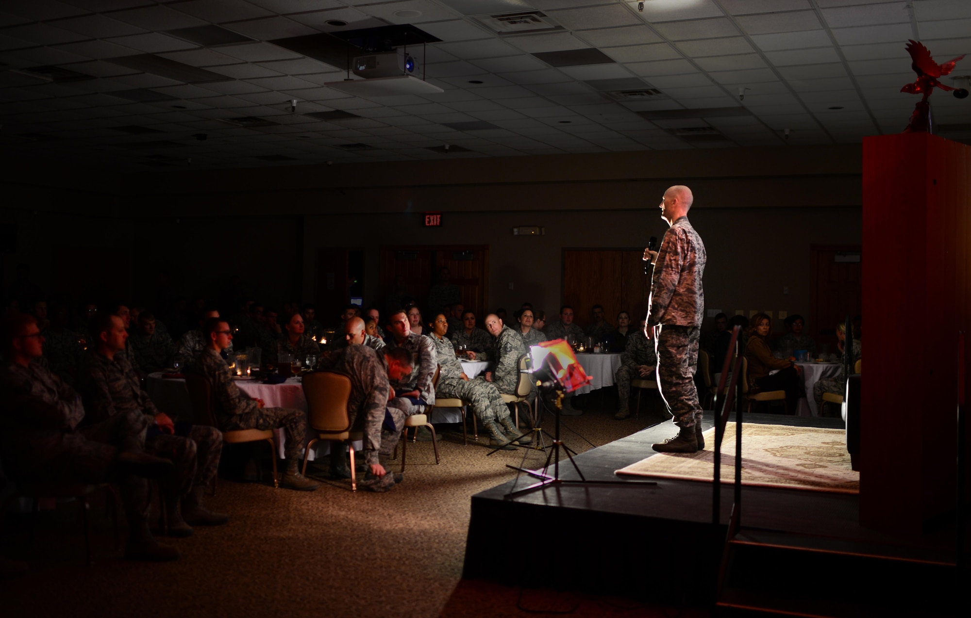 U.S. Air Force Capt. Martin Barnes, 27th Special Operations Wing chaplain, prompts Air Commandos to consider how they relate to a story of resilience at a Storytellers luncheon April 15, 2015 at Cannon Air Force Base, N.M. Barnes encouraged audience members to connect their own stories to the stories of speakers onstage throughout the event. (U.S. Air Force photo/Airman 1st Class Shelby Kay-Fantozzi)