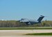 A U.S. Air Force C-17 Globemaster III takes off from Dover Air Force Base, Del., April 26, 2015. The aircraft is loaded with 69 members of the Fairfax County Urban Search and Rescue Team, supplies and equipment, and six K-9s, to assist Nepal with rescue operations after the country was struck by a 7.8-magnitude earthquake.  (U.S. Air Force photo/Airman 1st Class William Johnson)