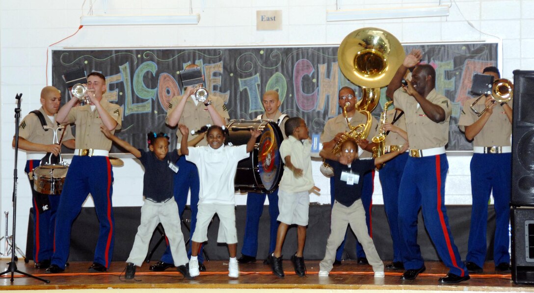 The Albany Marine Band performs at a school and this photo is an example of the variety of musical performances it conducted. Marine Corps Logistics Command officials honored the former Albany Marine Band with a display showcase and small ceremony April 28 in Logistics Command’s Headquarters Building, aboard Marine Corps Logistics Base Albany.