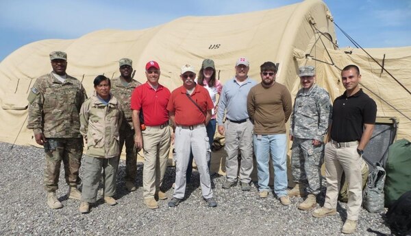 The 542nd Forward Engineering Support Team - Advanced gathers for a group photo at a camp in Iraq. The team is completing a six-month deployment supporting the Combined Joint Task Force with a wide array of engineering missions across the U.S. Central Command area of responsibility.