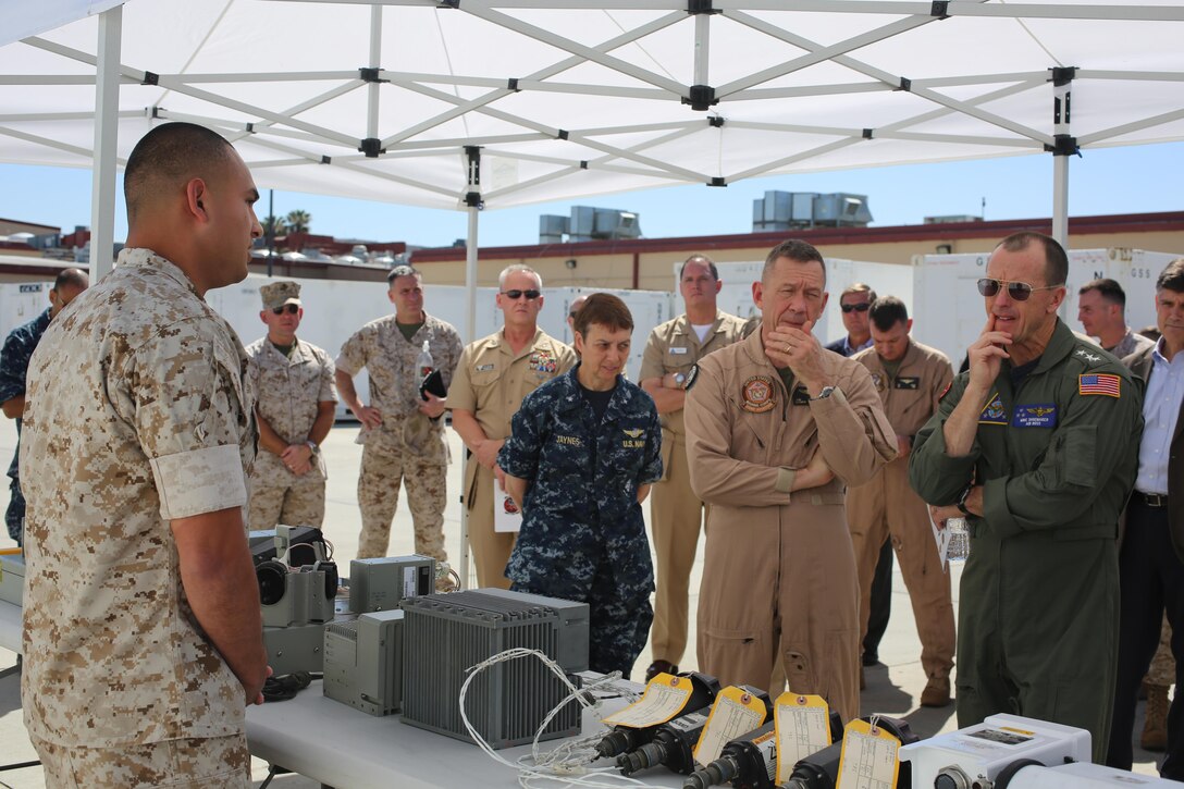 Sgt. Mark Govea, an avionics technician with Marine Aviation Logistics Squadron 39 and a Corpus Christi, Texas native, conducts a presentation during ‘Boots on the Ground’ aboard Marine Corps Air Station Camp Pendleton, California, April 27. Leaders from the Naval Aviation Enterprise visited elements of Marine Aircraft Group 39 during this event, linking NAE representatives with Marines and Sailors working with aircraft. (U.S. Marine Corps photo by Sgt. Melissa Wenger/Released)