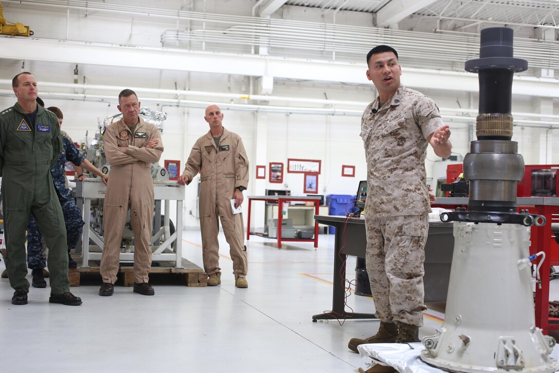 Sgt. Carlos Rivera, a cadmium plating technician with Marine Aviation Logistics Squadron 39 and a McAllen, Texas, native, conducts a presentation during ‘Boots on the Ground’ aboard Marine Corps Air Station Camp Pendleton, California, April 27. Leaders from the Naval Aviation Enterprise visited elements of Marine Aircraft Group 39 during this event, linking NAE representatives with Marines and Sailors working with aircraft. (U. S. Marine Corps photo by Sgt. Melissa Wenger/Released)