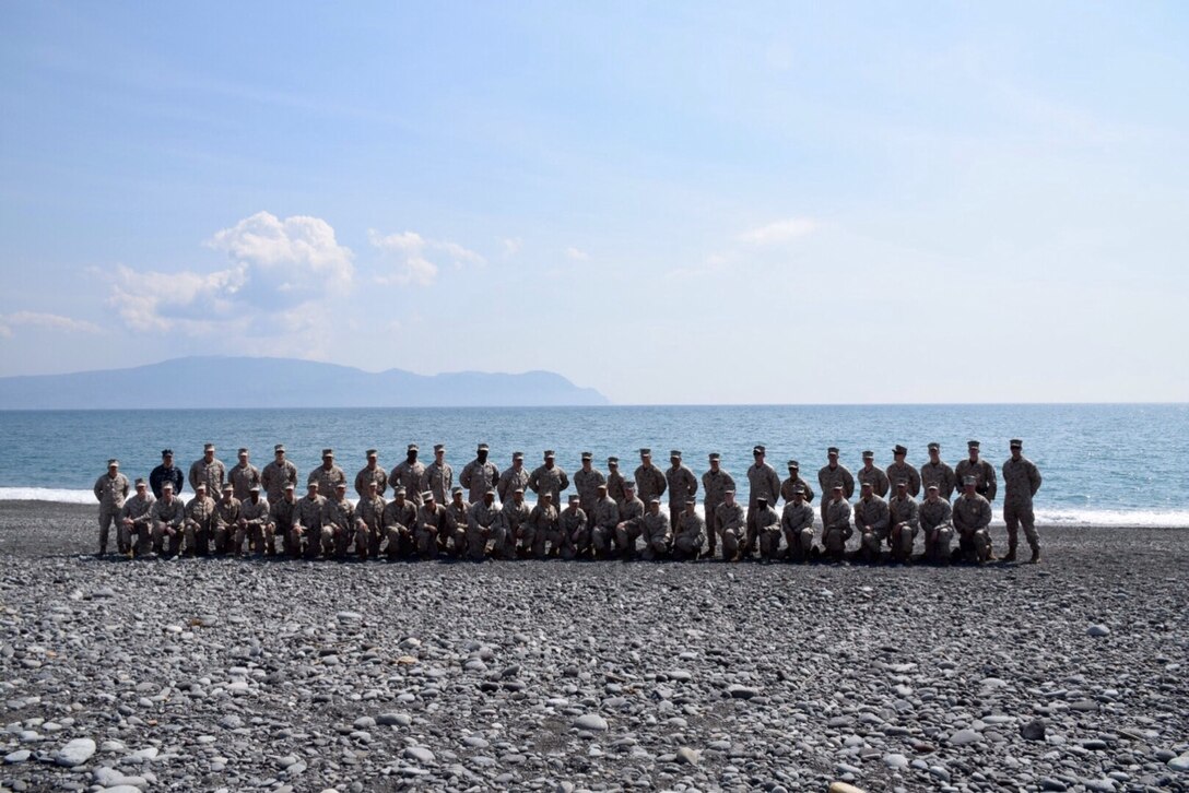 Marines, sailors, and civilians from CATC Camp Fuji conducted a clean-up of the Marine Corps training area at Numazu Beach in commemoration of Earth Day, Thursday April 23, 2015.