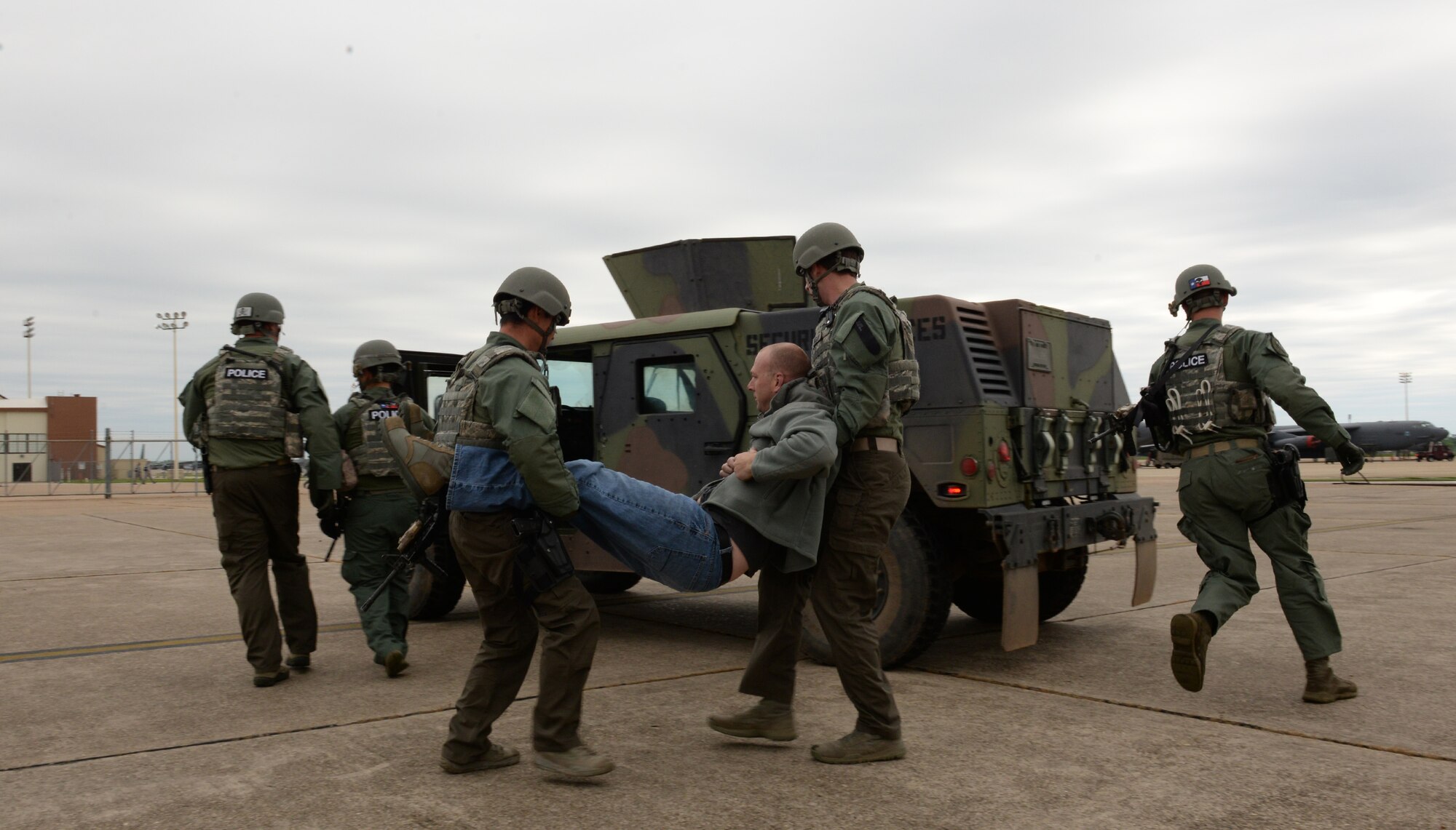 Barksdale defenders respond to a simulated victim during a Major Accident Response Exercise on Barksdale Air Force Base, Louisiana, April 28, 2015. The 2nd Bomb Wing holds an annual MARE before every air show to evaluate how base units and community emergency services agencies respond to an incident.  (U.S. Air Force photo/Airman 1st Class Curt Beach)