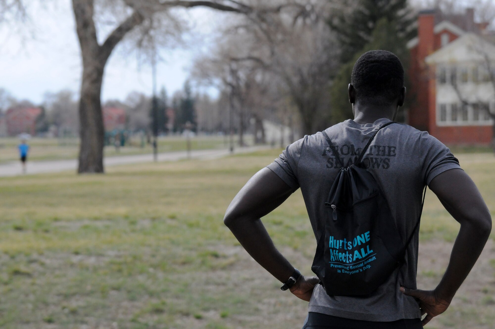 Kwadwo Opokuagyemang, 790th Missile Security Forces Squadron member, takes a breather after the Sexual Assault Prevention and Response Awareness 5k Run on F.E. Warren Air Force Base, Wyo. April 24, 2015. Several items were given to the participants of the awareness run including a bag stating “Hurts One Affects All.” (U.S. Air Force photo by Airman 1st Class Malcolm Mayfield)
