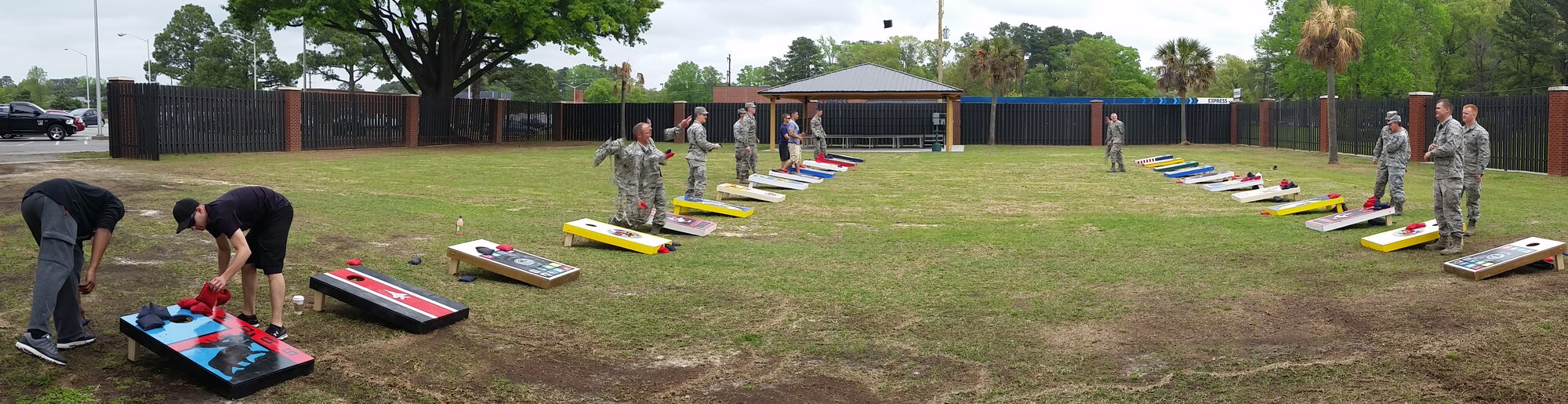 Team Seymour Airmen participate in a cornhole tournament during the grand opening of the Eagle’s Nest, April 17, 2015, at Seymour Johnson Air Force Base, North Carolina. Along with a variety of indoor activities, the Eagle’s Nest also features a gazebo and fire pit for other outdoor events. (U.S. Air Force photo/Senior Airman Brittain Crolley)