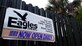 A sign is displayed outside the Kitty Hawk lounge to mark the grand opening of the Eagle’s Nest, April 17, 2015 at Seymour Johnson Air Force Base, North Carolina. The Eagle’s Nest is collocated with Kitty Hawk and offers Airmen of all ranks a place to relax, socialize and enjoy various activities. (U.S. Air Force photo/Senior Airman Brittain Crolley)