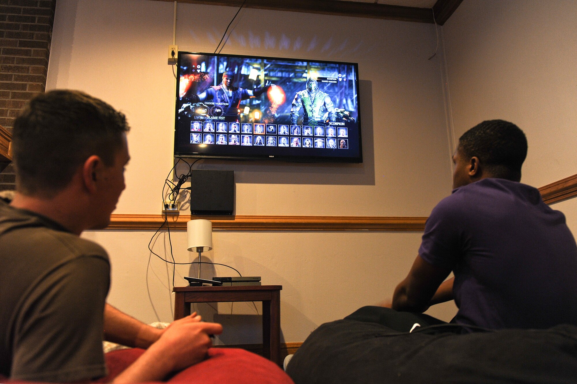 Airman Dylan McLain (left) and Airman 1st Class Marques Heflin (right), 4th Component Maintenance Squadron avionics technicians, play a video game April 22, 2015, at the Eagle’s Nest. Both McLain and Heflin are members of the video game club, which meets each Wednesday at the Eagle’s Nest. (U.S. Air Force photo/Airman 1st Class Aaron J. Jenne)